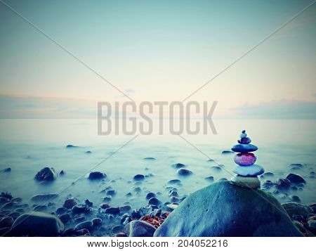 Stones Balance On Rounded Stone At Sea, Concept Inspiration. Beautiful Landscape Background
