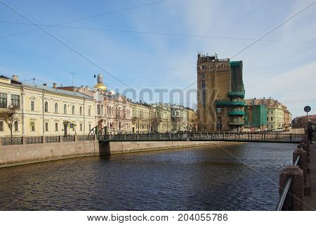 A walk along the embankment of the Moika River in St. Petersburg the Pochtamtsky Bridge