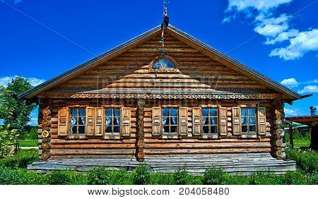 The Izba, traditional wooden house in russian style.