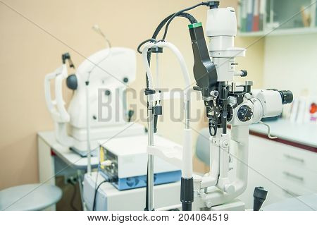 Professional Optometrist Diopter Tool In An Optician Laboratory. Medical And Health Concept. Selecti