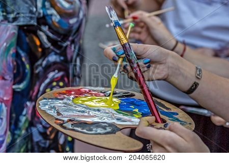 Body painting of a woman. 3D art symbolizing on live at the street inside the CheckART Carnival organized by the City Hall Timisoara. Liberty Square.