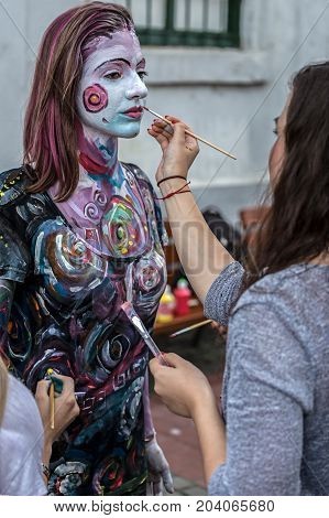 TIMISOARA ROMANIA - SEPTEMBER 8 2017: Face and body painting of a woman. 3D art symbolizing on live at the street inside the CheckART Carnival organized by the City Hall Timisoara. Liberty Square.