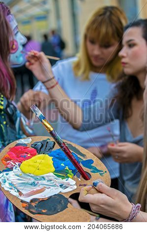 TIMISOARA ROMANIA - SEPTEMBER 8 2017: Face and body painting of a woman. 3D art symbolizing on live at the street inside the CheckART Carnival organized by the City Hall Timisoara. Liberty Square.