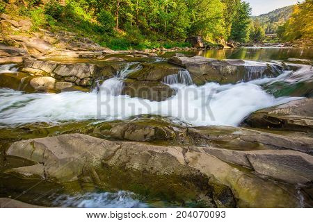 Mountainwaterfall Probiy in the wood landscape. Ukrainian Carpathians.