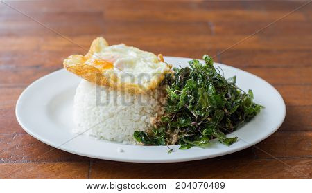 Crispy Basil Herb Pork And Egg  With Fried Egg
