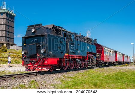 Brocken Germany - May 27. 2017: Steam train leaving Brocken train station