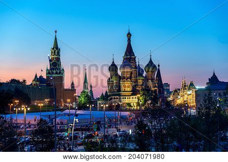 Saint Basil's Cathedral in Red Square and Kremlin from New Zaryadye Park in Moscow sunset view