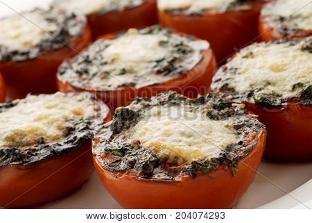 Stuffed tomatoes with cheese baked in the oven