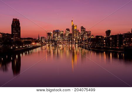 Frankfurt am Main, Hessen, Germany - March 16, 2017: Frankfurt am Main city skyline during blue hour in Frankfurt, Germany