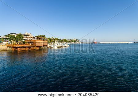 POMORIE BULGARIA - AUGUST 17 2017: The water area of the seaport of the seaside resort town of Pomorie.
