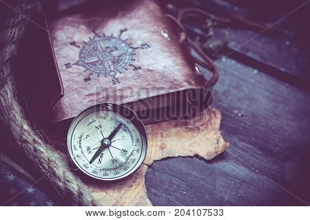 Columbus day and world map with compass