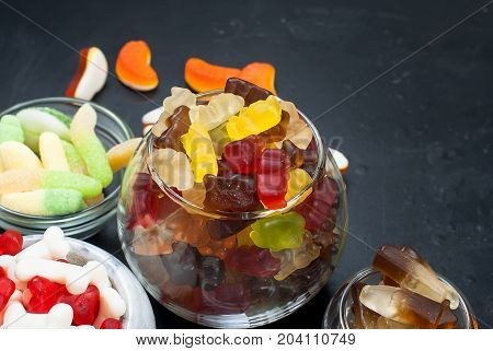 Tasty Different Jelly Candy On Black Background