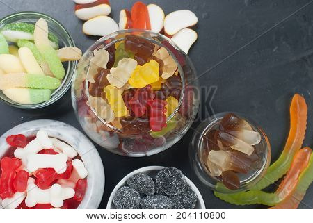 Tasty Different Jelly Candy On Black Background