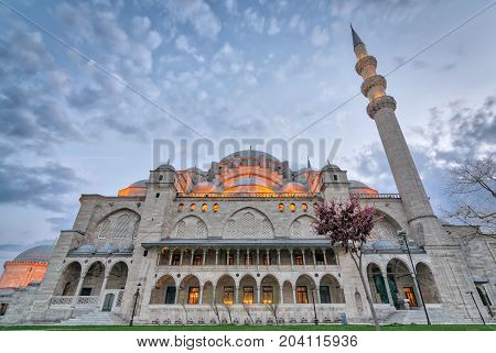 Exterior low angle shot of Suleymaniye Mosque before dusk. An Ottoman imperial mosque located on the Third Hill of Istanbul Turkey and the second largest mosque in the city. built in 1557