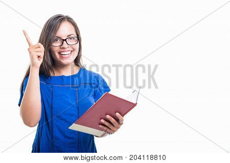 Portrait Of Student Girl Holding Notebook Having An Idea