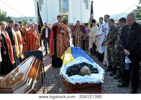 Rosokhach - Chortkiv - Ukraine - September 5 2014. Villagers and district Rosokhach say goodbye to Ukrainian soldier killed in Donbas in the war with Russia