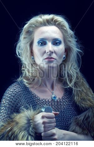 ancient  northern Valkyrie. Viking girl with sword