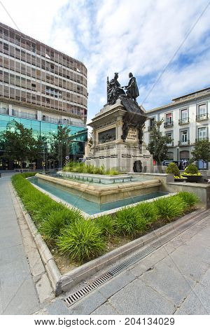 Monument To Ferdinand And Isabella In The Plaza Isabel La Catolica, Granada,