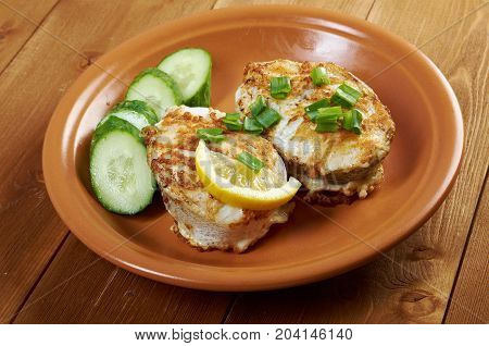 grilled t-bone codfish steak and vegetables  , close up traditional meal
