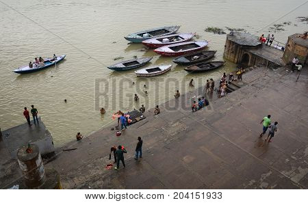 People Take Holy Bath In The Ganges River