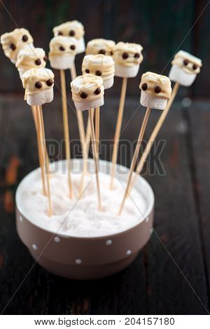 Halloween Lolipopes like mumi. Dessert for Halloween