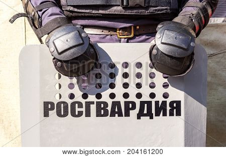 Russian riot police used shields. Text in russian: 