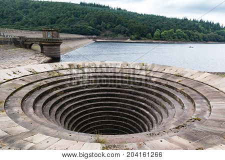 Concrete Overflow drain at Ladybower Reservoir. Reservoir water very low due to lack of rain fall.