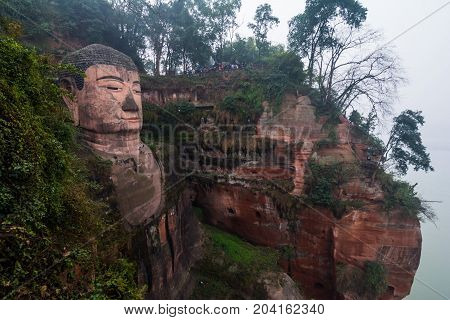 View of the Buddha statue in Leshan, China. Leshan Buddha is the world's largest statue of Buddha, whose height is 71 meters.