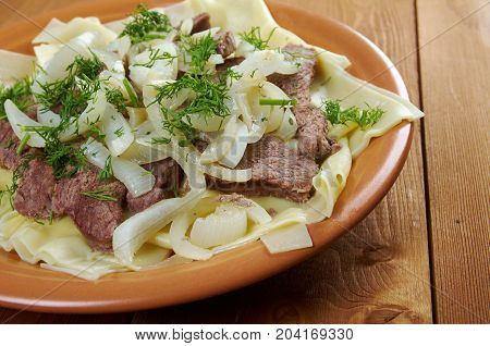 Beshbarmak: Traditional meat asian cuisine close up traditional meal