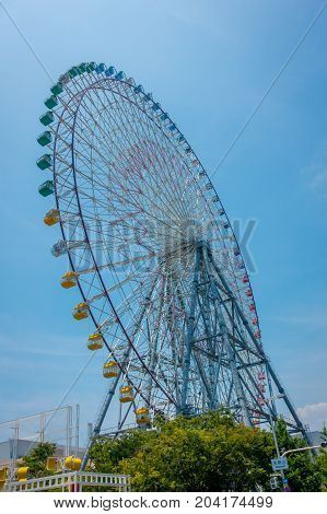 OSAKA, JAPAN - JULY 18, 2017: Tempozan Ferris Wheel in Osaka, Japan. It is located in Tempozan Harbor Village, next to Osaka Aquarium Kaiyukan.