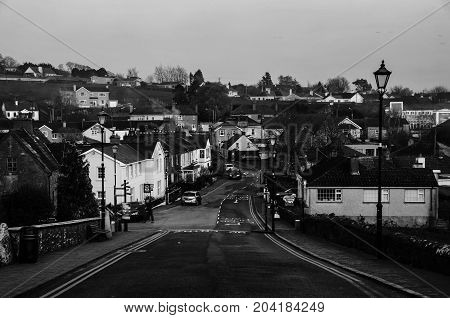 Cashel Ireland. Aerial view of small town Cashel in Tipperary County of Ireland colorful sunset sky. Black and white