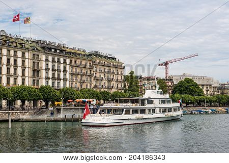 Geneva Switzerland - May 25 2016: Cruise ship named - Henry Dunant by founder of International Committee of the RC Organization based in Geneva harbour in Geneva Switzerland.