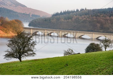 Bridge over Lower Derwent Reservoir as it joins Ladybower Reservoir in Peak District National Park Derbyshire England UK