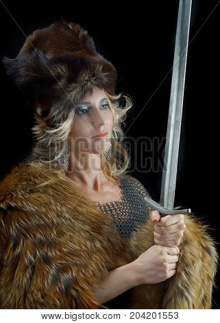 medieval Valkyrie. Viking romantic girl with sword