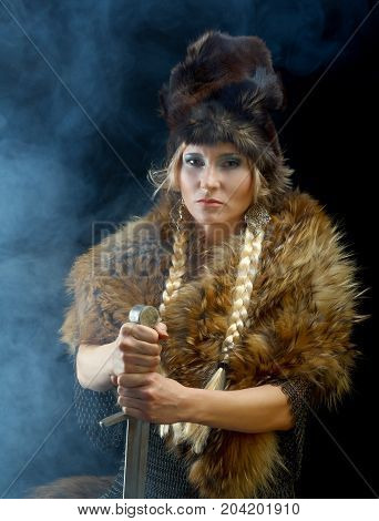 medieval Valkyrie. Viking romantic girl with sword