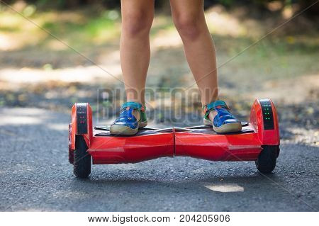 Child On Hover Board. Kids Ride Scooter.