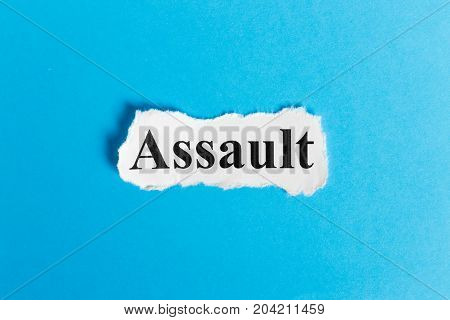 Assault text on paper. Word Assault on a piece of paper. Concept Image.