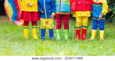 Kids In Rain Boots. Rubber Boots For Children.