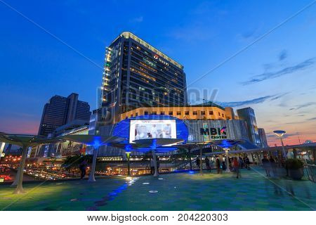 Bangkok , Thailand - 13 September, 2017: MBK sky walk in Sunset time / Walk way new design in front of the MBK center shopping mall in Bangkok