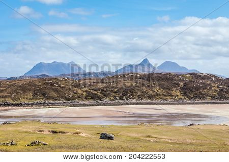 Achnahaird Bay with the mountains of Inverpolly in the distance.