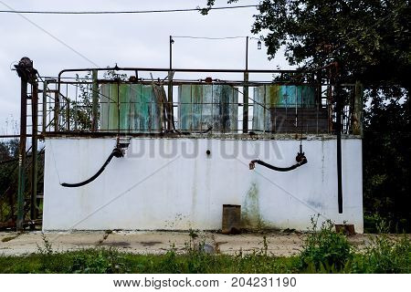 Station For Refueling Fertilizers. A Stationary Garden Station Where Fertilizers And Chemicals Are B