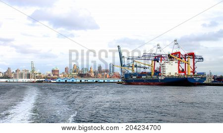 New York USA - 28 September 2016: Container Ship Conti Arabella docked at the Red Hook Marine Terminal along the Brooklyn waterfront.