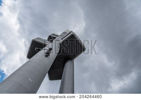 Prague, Czech Republic - August 21, 2017: Zizkov Television Tower in Prague. It is is a  transmitter tower and an example of high tech architecture. Low angle view a cloudy day of summer.