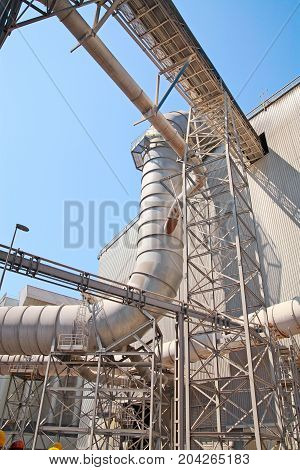 Ductwork Ventilation At Steel Foundry Outdoors, Against The Sky