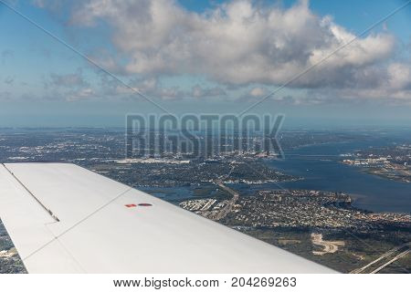Aerial view of city Bradenton Florida. Approach to land at the airport in St. Petersburg. Manatee River Florida