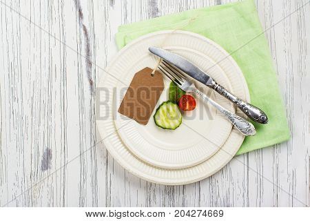 Small portion of food. Anorexia or unhealthy diet concept. Top view