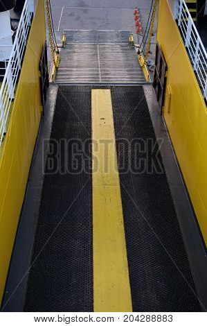 Ferry boat bow visor door hatch and ramp for loading vehicles.
