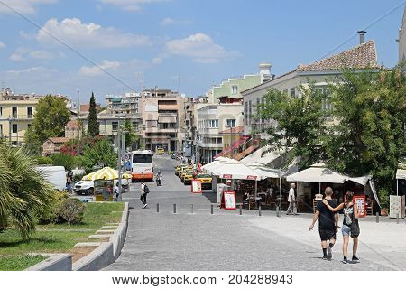 ATHENS GREECE - AUGUST 4 2016: People on a hot summer day in the city of Athens Greece.