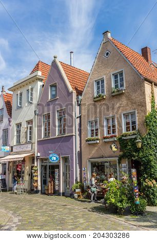 BREMEN, GERMANY - AUGUST 23, 2017: Colorful little shops in the historic Schnoor district of Bremen, Germany