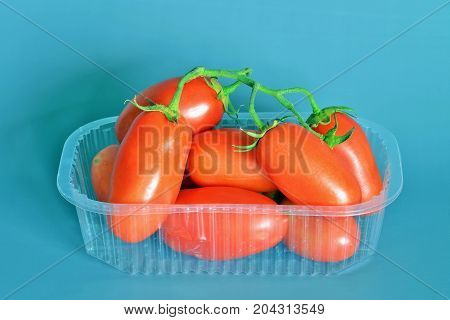 Tomatoes San Marzano, Campania, italy

Group of tomatoes San Marzano, bunch cluster, still life on gray-blue background